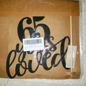 65 years loved sign!